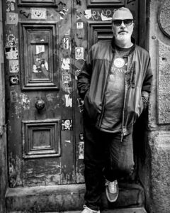 Trustee Andy Roberts, standing in a doorway